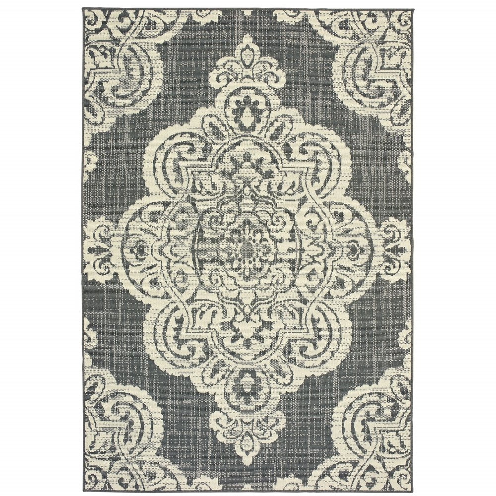 Gray and ivory oriental pattern indoor outdoor area rug on a white background