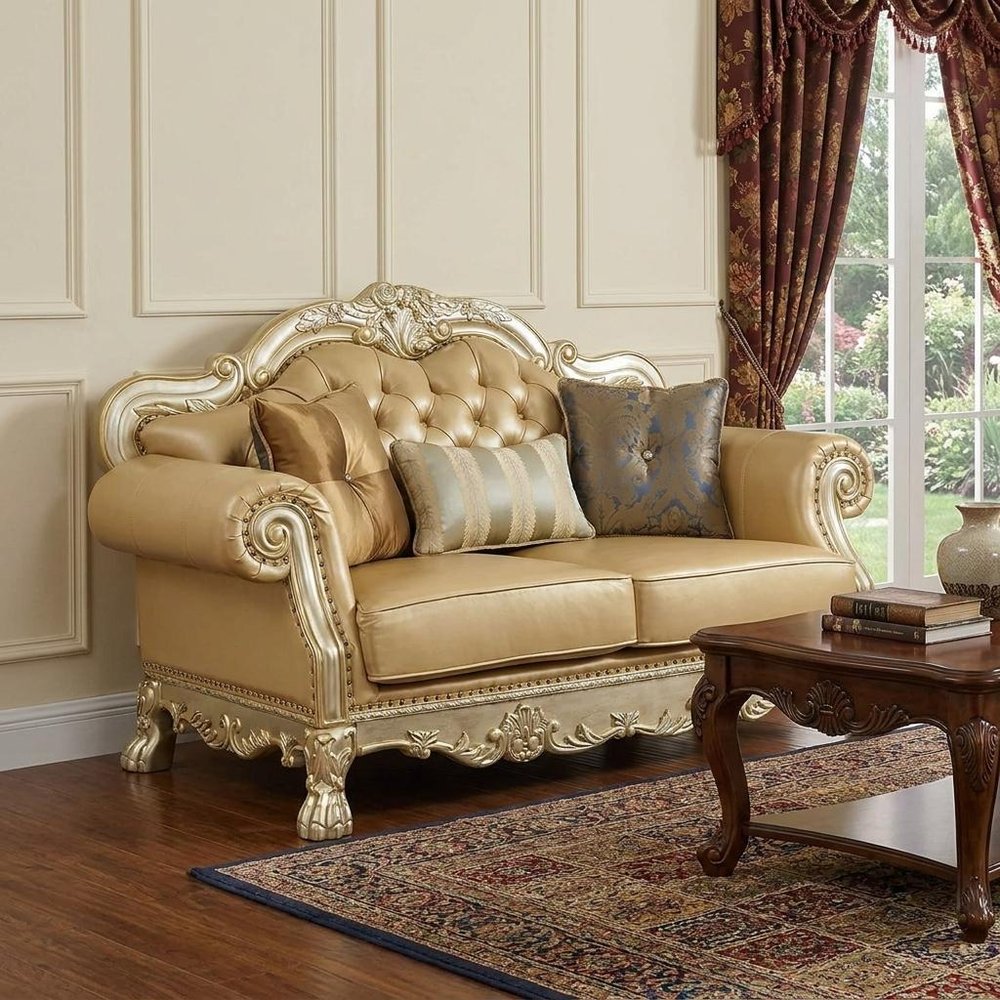 64" Bone And Gold Faux Leather Loveseat and Toss Pillows