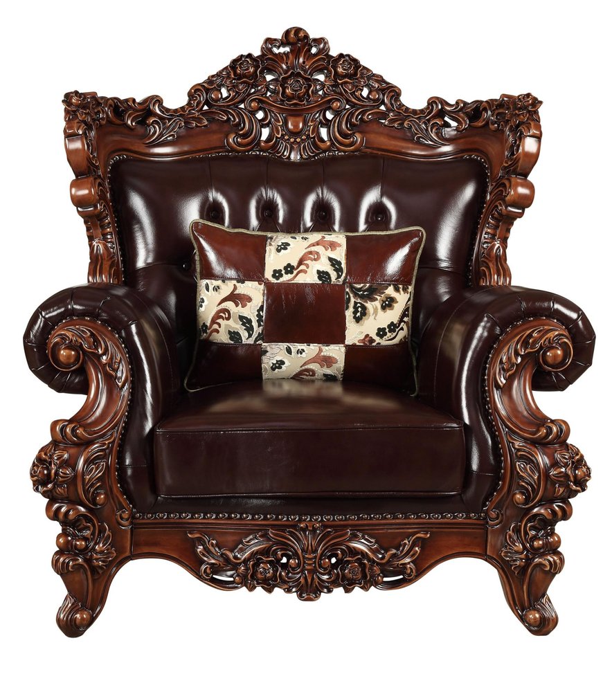 50" Espresso Faux Leather Tufted Wingback Chair And Toss Pillow. Accent chair isolated on a plain white background, finished in burgundy faux leather.
