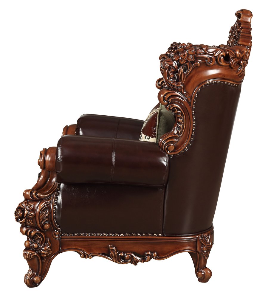 50" Espresso Faux Leather Tufted Wingback Chair And Toss Pillow. Accent chair isolated on a plain white background, showing a burgundy faux leather surface.