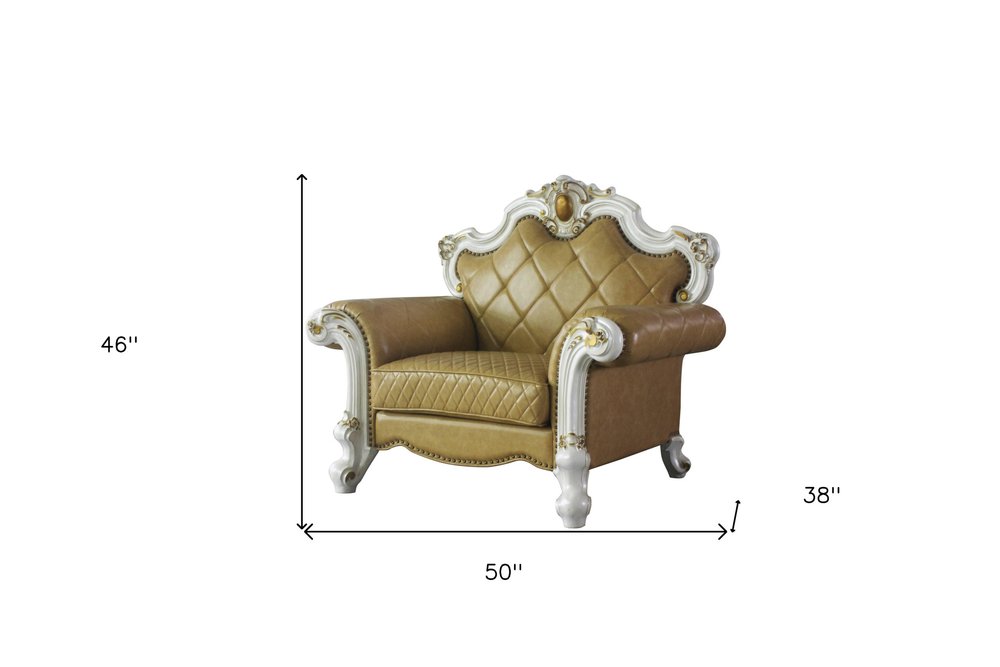 50" Beige and Pearl Faux Leather Tufted Arm Chair And Toss Pillow. Accent chair isolated on a plain white background, in a beige faux leather finish.