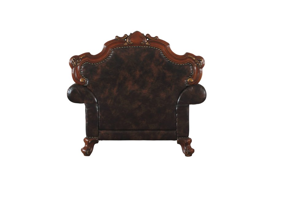 50" Chocolate Faux Leather Tufted Chesterfield Chair And Toss Pillow. Accent chair isolated on a plain white background, finished in black faux leather.