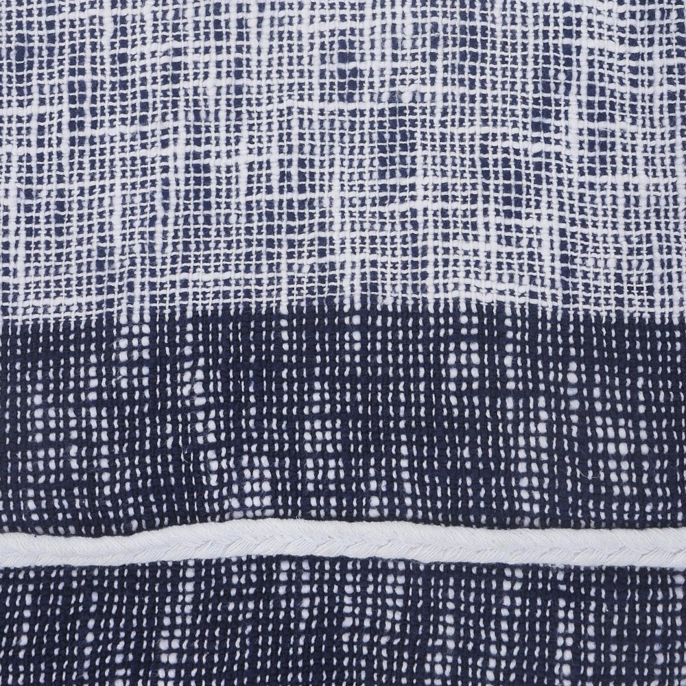 Blue Woven Cotton Geometric Throw in a home interior