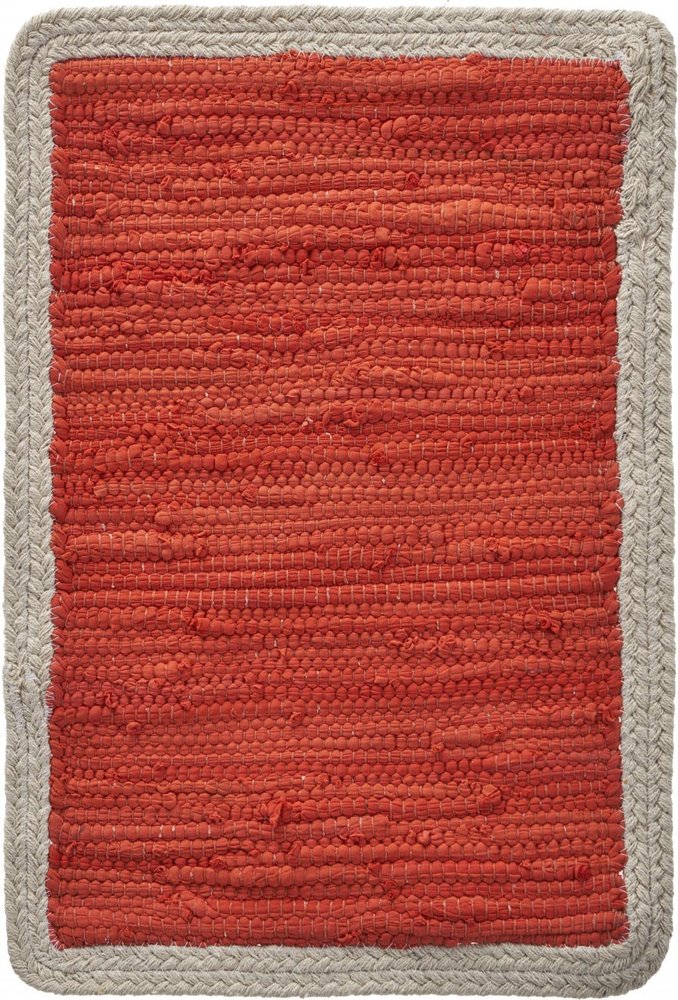 A close-up of a set of four orange cotton placemats with a natural braided border.