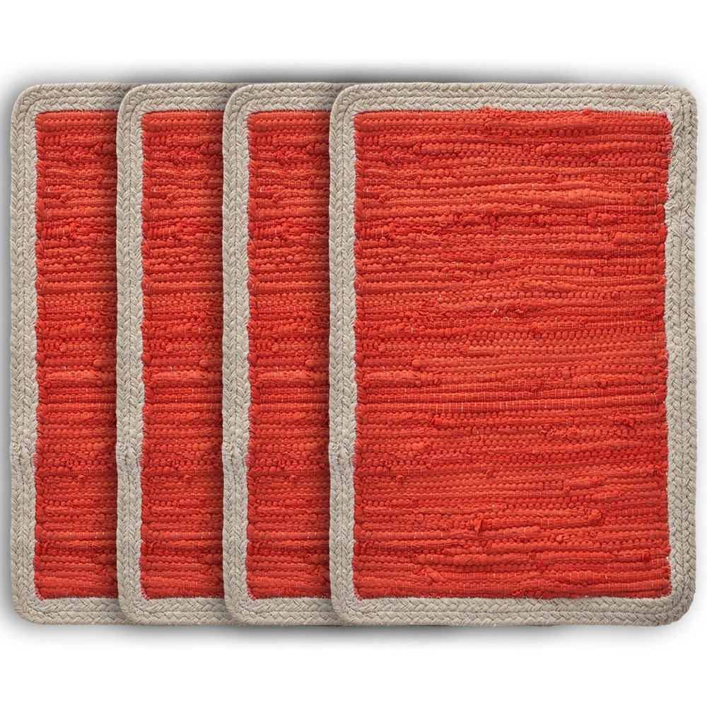 19" Set of Four Orange And Natural Solid With Border Cotton Placemats. Dining linen isolated on a plain white background, finished in tan linen.