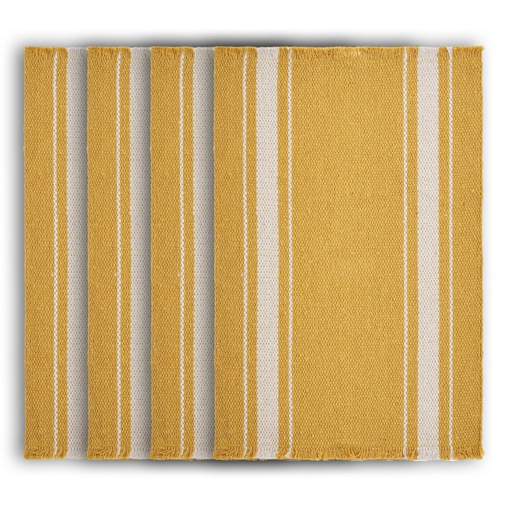 19" Set of Four Yellow And White Striped Cotton Placemats. Dining linen isolated on a plain white background, showing a white linen surface.