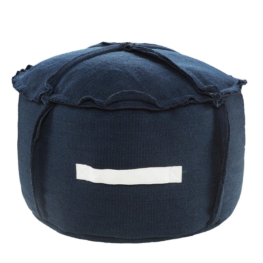 Dark blue polyester round pouf ottoman with a white fabric handle on a white background.