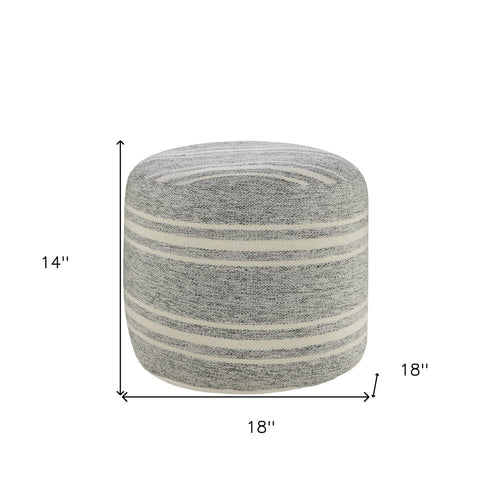 Gray and white striped round pouf ottoman, 14 inches high and 18 inches wide, on a white background.