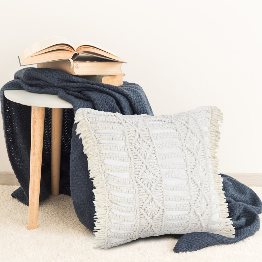 24" X 24" White Zippered Tropical Indoor Outdoor Throw Pillow. Outdoor pillow isolated on a plain white background, finished in white fabric.