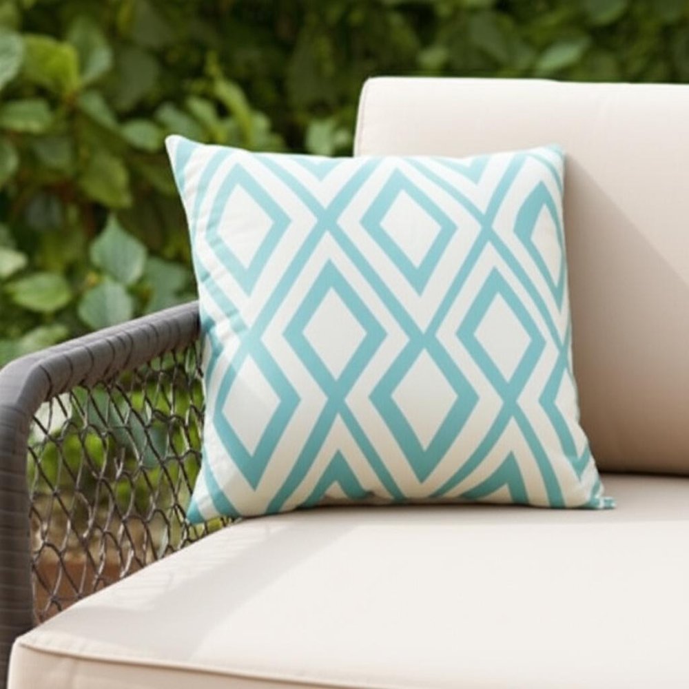 20" Aqua and White Geometric Indoor Outdoor Throw Pillow. Outdoor pillow in white.