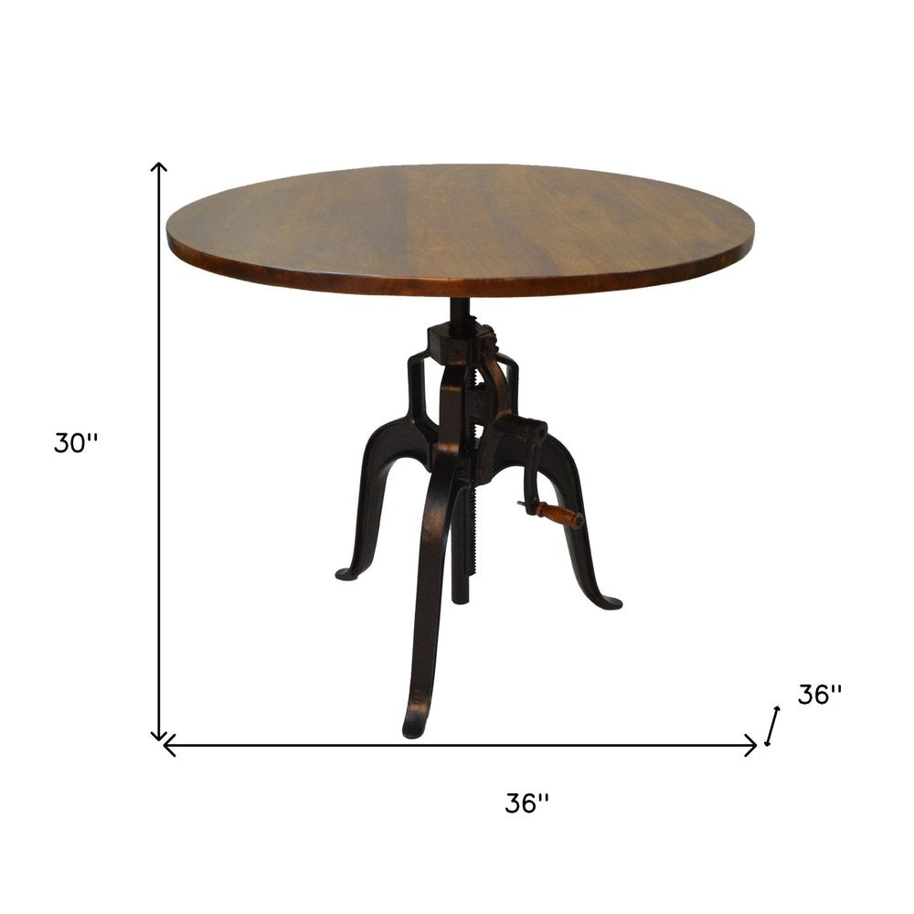 Adjustable Height Brown And Black Solid Wood And Iron Pedestal Base Round Top Dining Table on a white background