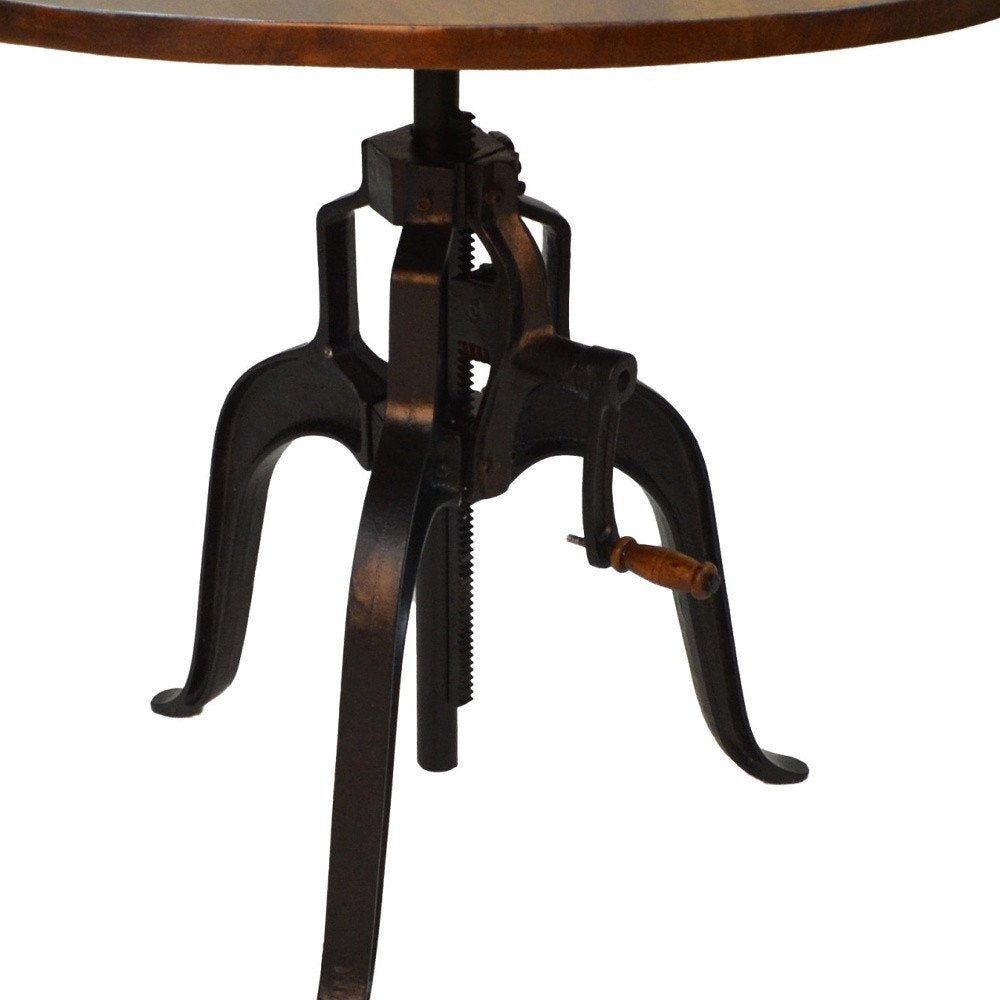 Adjustable Height Brown And Black Solid Wood And Iron Pedestal Base Round Top Dining Table on a white background