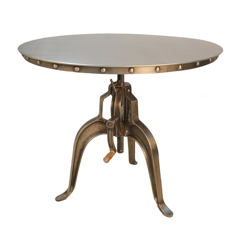 Round dining table with antiqued nickel three-leg base and adjustable height crank.