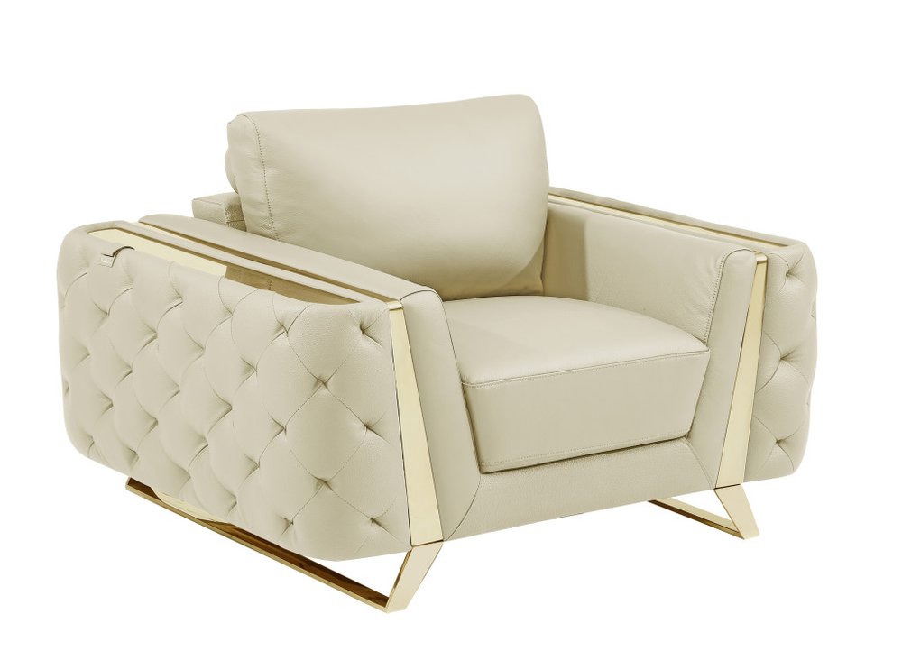 Beige genuine leather tufted club chair with gold metal accents on a white background.