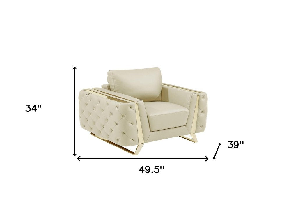 50" Beige And Gold Genuine Leather Tufted Club Chair. Accent chair isolated on a plain white background, showing a beige leather surface.