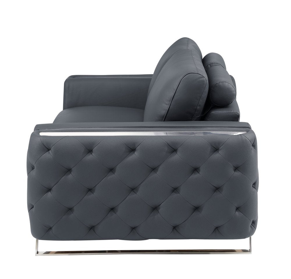 50" Beige And Gold Genuine Leather Tufted Club Chair. Accent chair isolated on a plain white background, showing a leather surface.