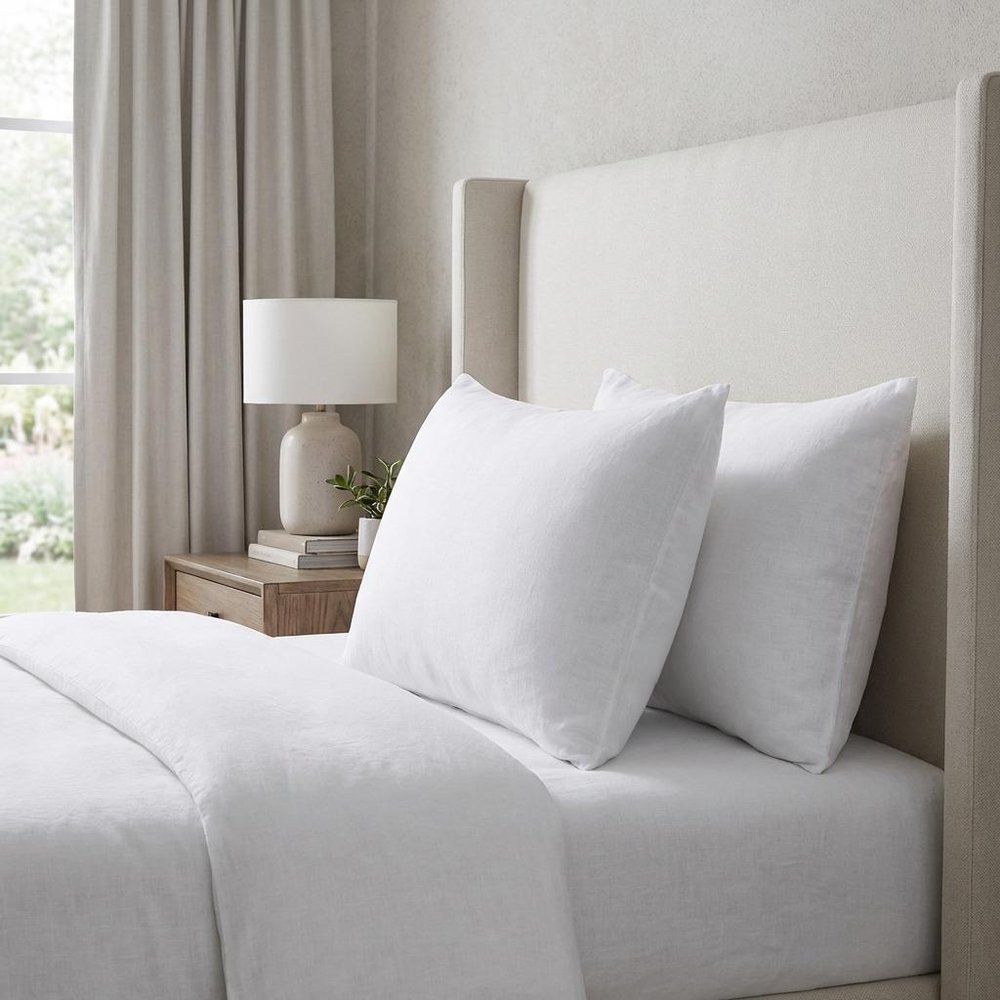 Set of Two White Linen King Pillowcases in a home interior