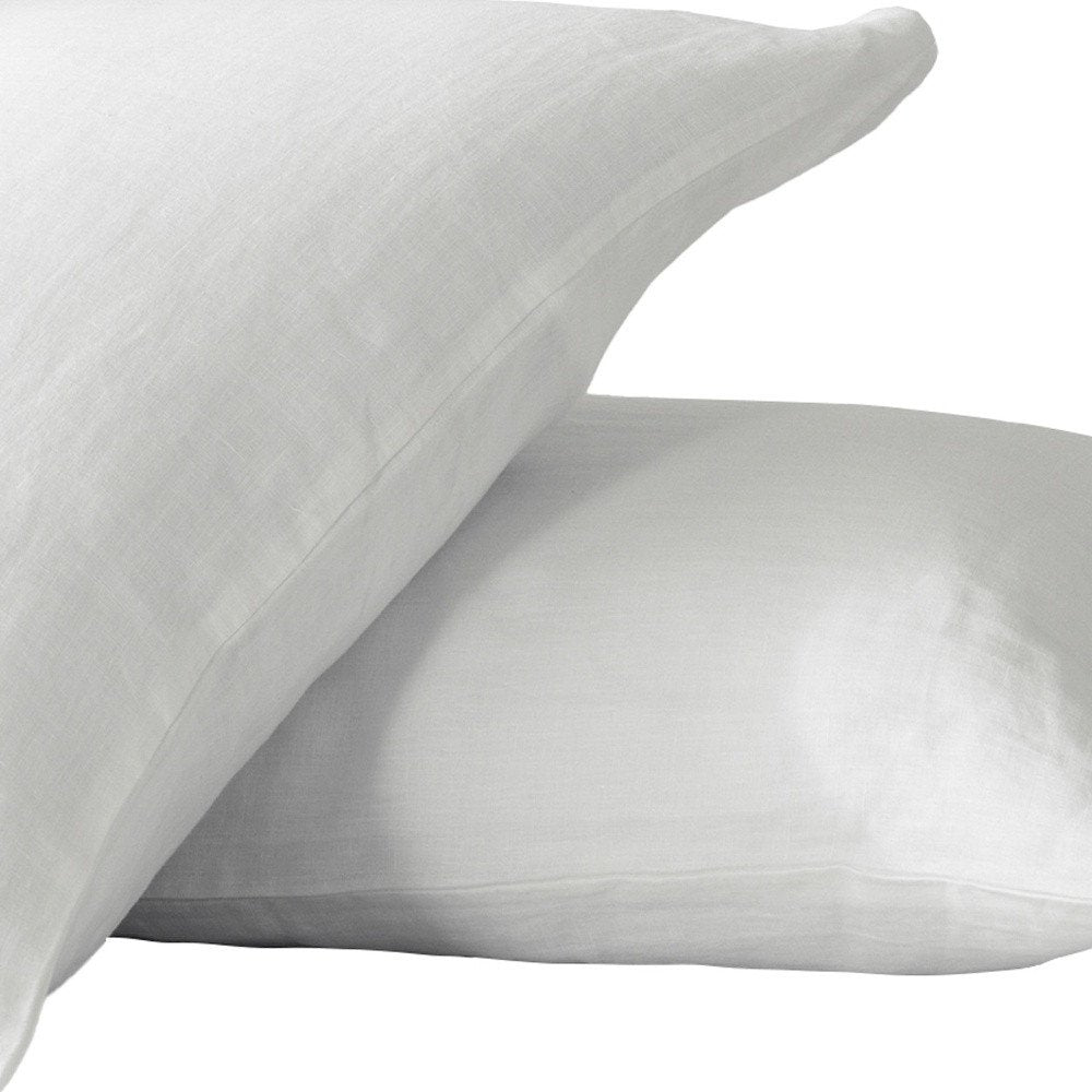 Set of Two Ivory Linen King Pillowcases on a white background