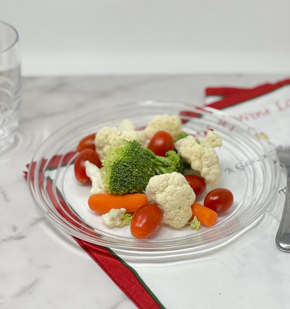 Clear Four Piece Round Swirl Acrylic Service For Four Salad Plate Set on a white background