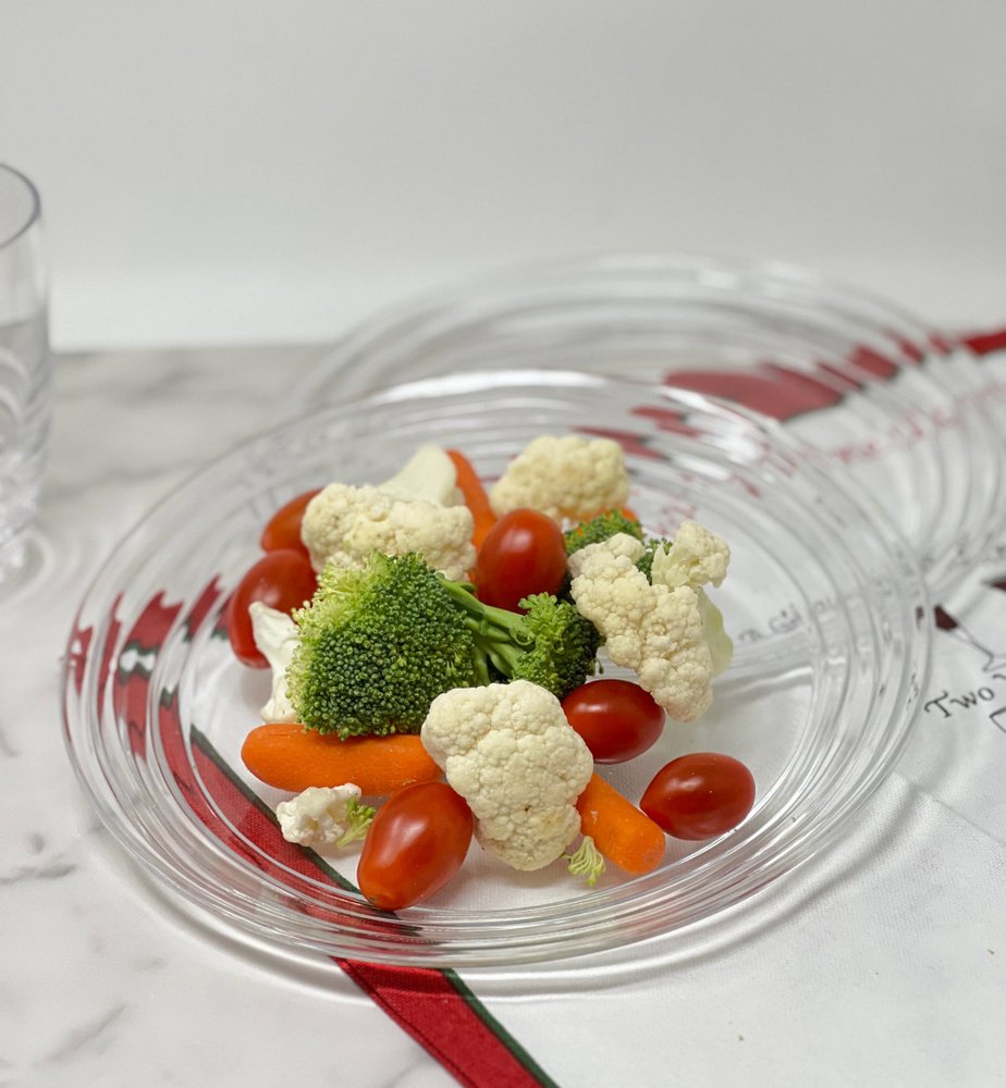 Clear Four Piece Round Swirl Acrylic Service For Four Salad Plate Set on a white background