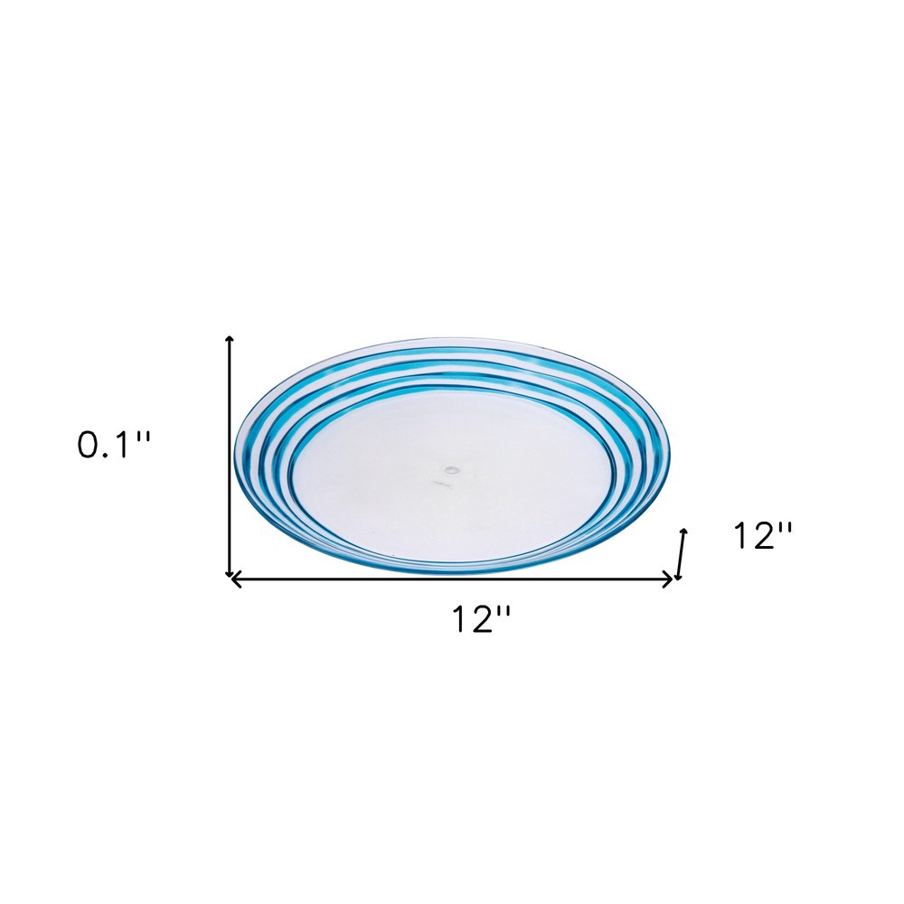 Clear and Blue Four Piece Swirl Acrylic Service For Four Dinner Plate Set on a white background