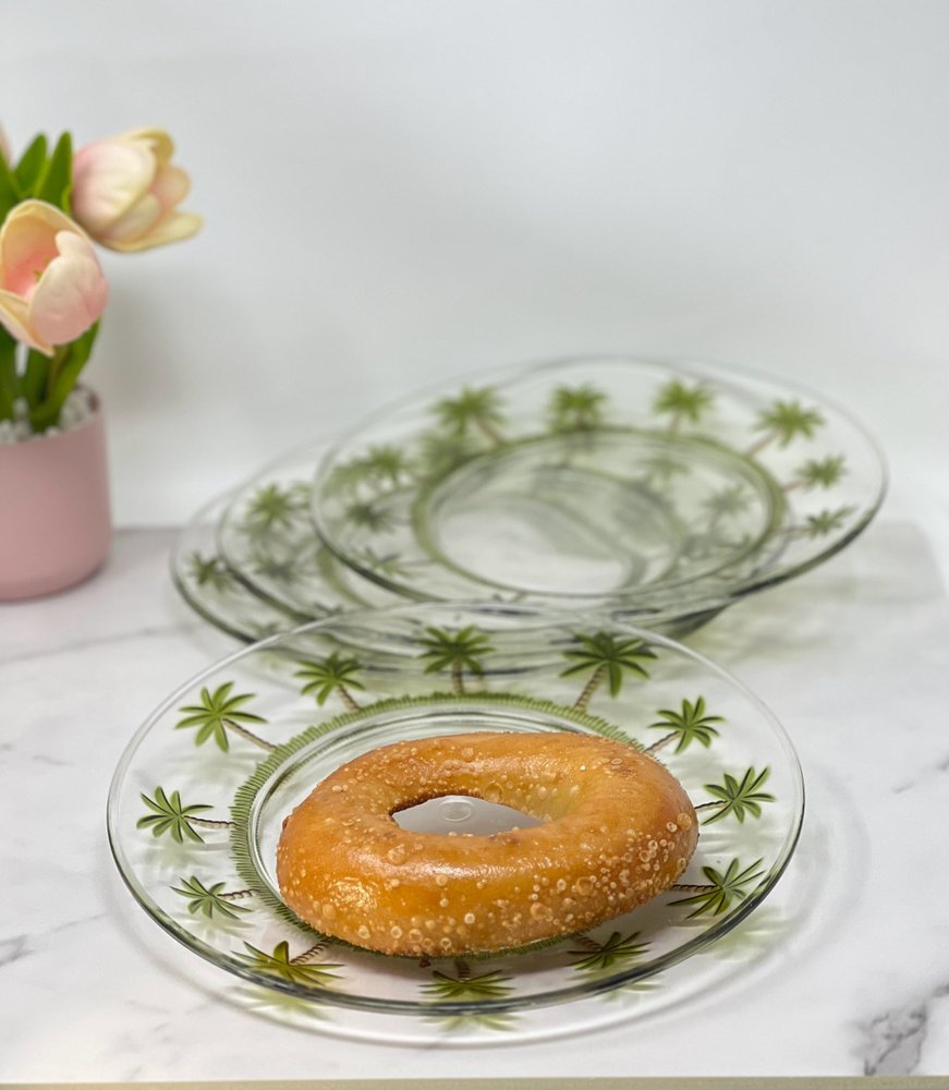 Clear and Green Four Piece Palm Tree Acrylic Service For Four Dinner Plate Set on a white background