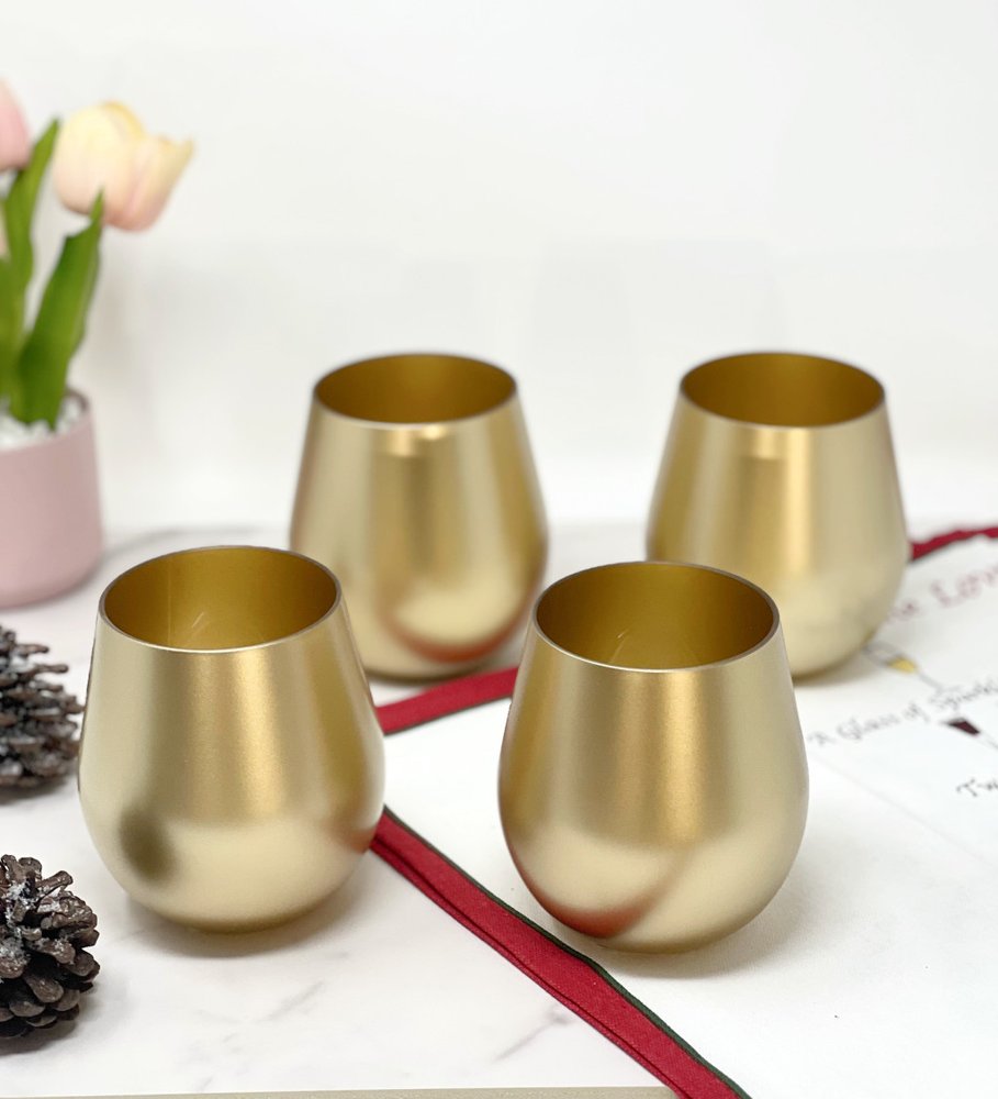 Set of Four Gold Acrylic Stemless All Purpose Wine Glass on a white background