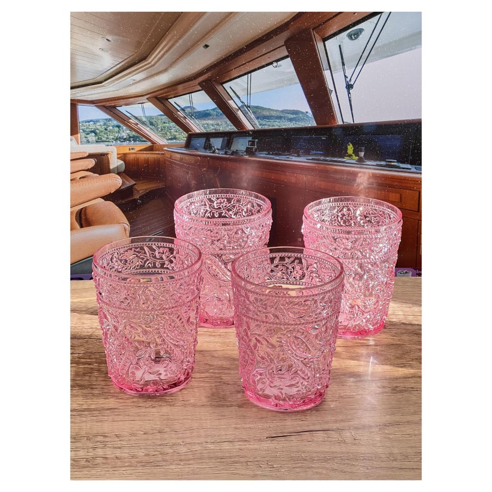 Set of Four Pink Paisley Acrylic Stemless Whiskey Glasses on a white background
