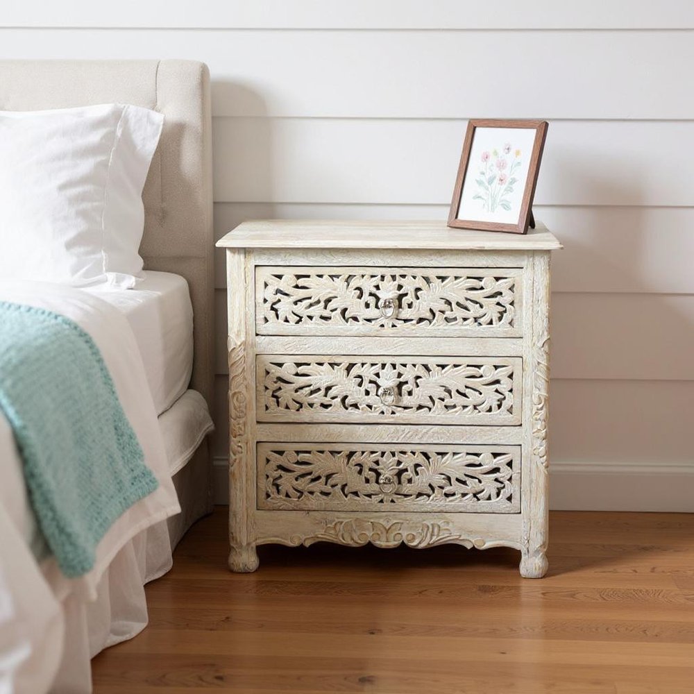 Cropped view of 30" White Solid Wood Distressed Three Drawer Nightstand focusing on the white wood surface.
