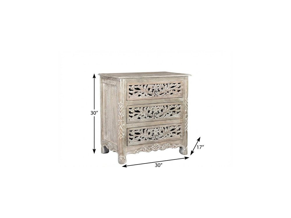 30" Distressed Gray Three Drawer Floral Carved Solid Wood Nightstand. Nightstands & bedside table isolated on a plain white background, in a gray wood finish.