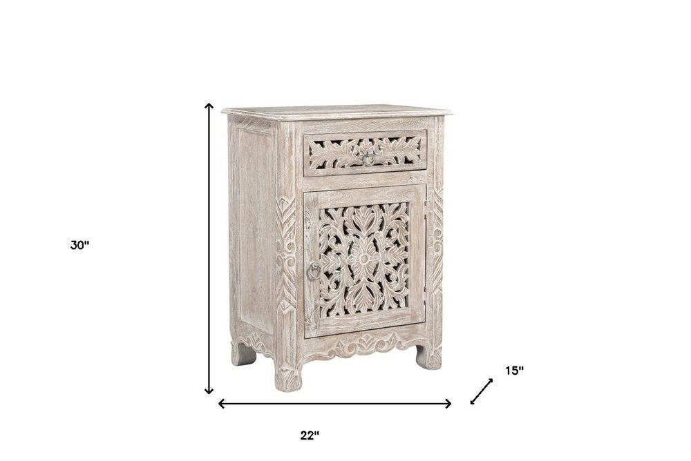 30" Distressed White One Drawer Carved Floral Solid Wood Nightstand. Nightstands & bedside table isolated on a plain white background, finished in white wood.