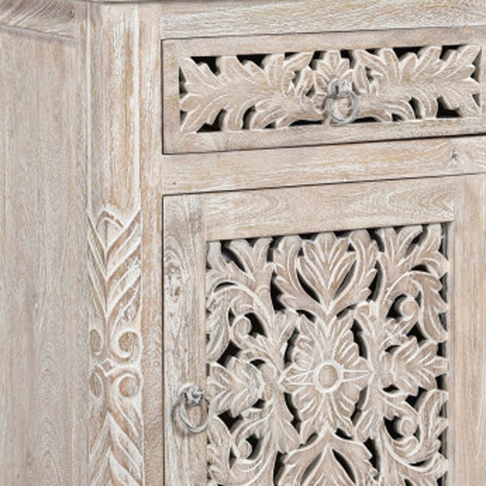 Detail view of 30" Distressed White One Drawer Carved Floral Solid Wood Nightstand, filling the frame with the white wood texture.