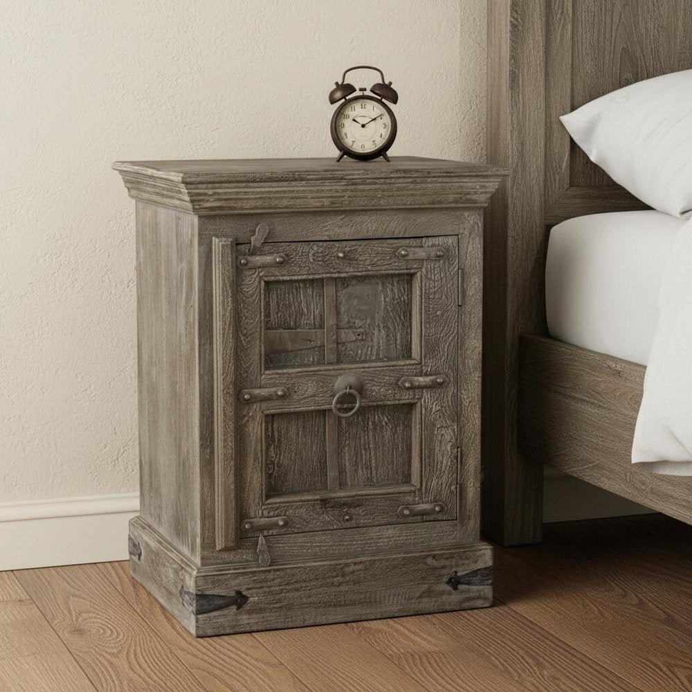 36" Brown Solid Wood Distressed Nightstand styled in a furnished interior with a cream wall on a dark wood floor.