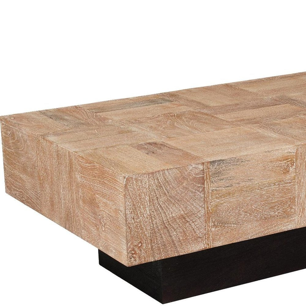 59" Natural and Black Solid Wood Block Coffee Table. Coffee table isolated on a plain white background, finished in black wood.