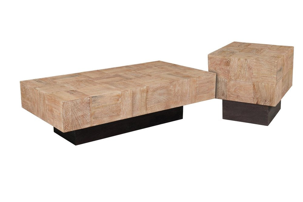 Rectangular and cube-shaped coffee tables made of light-colored wood blocks with dark bases on a white background.