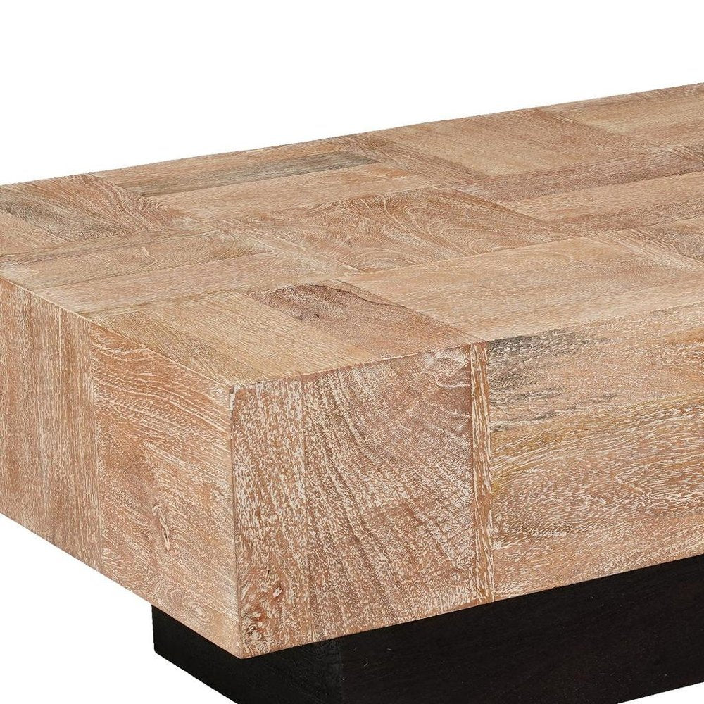 59" Natural and Black Solid Wood Block Coffee Table. Coffee table in black wood.