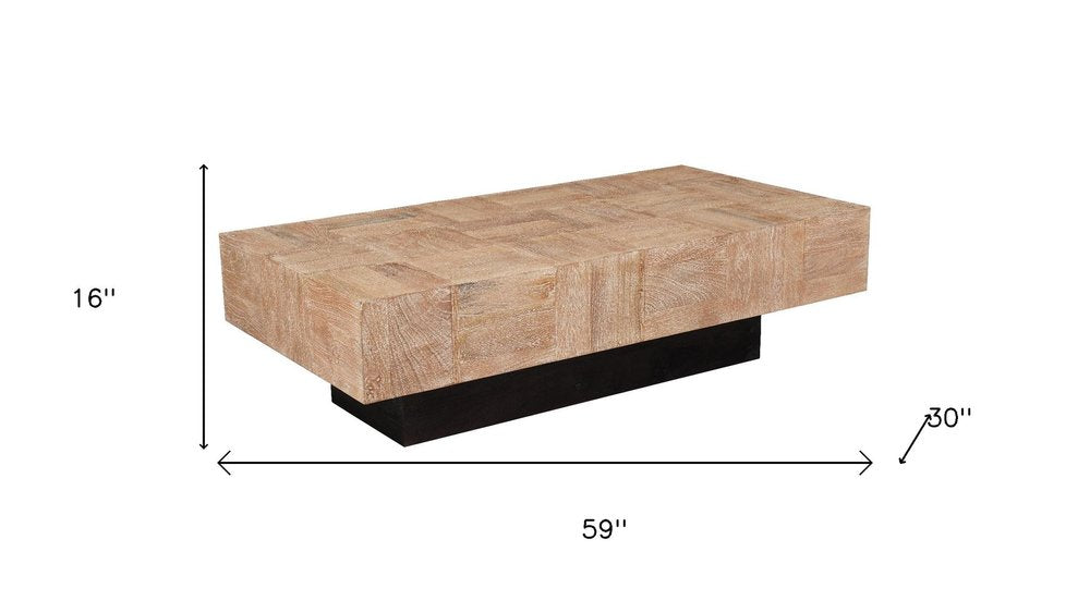 59" Natural and Black Solid Wood Block Coffee Table. Coffee table isolated on a plain white background, showing a black wood surface.