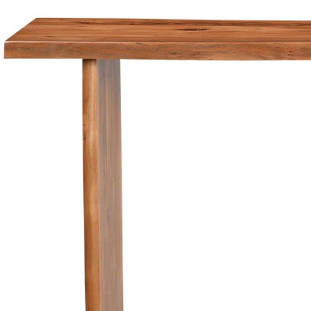 57" Chestnut Solid Wood Sled Console Table. Console table isolated on a plain white background, finished in tan wood.