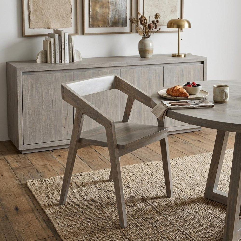 White Solid Wood Open Back Dining Arm Chair in a home interior