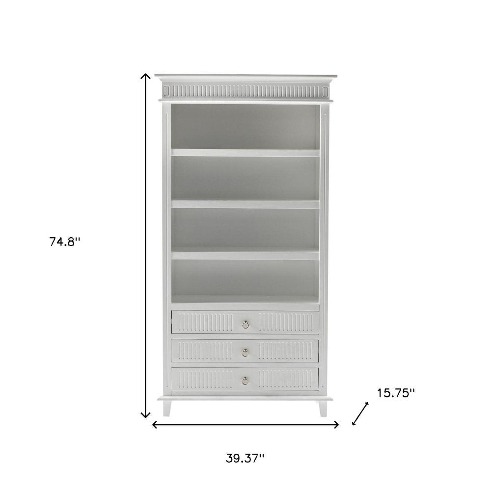 Antiqued White Solid Wood Four Tier Bookcase with Three Drawers on a white background