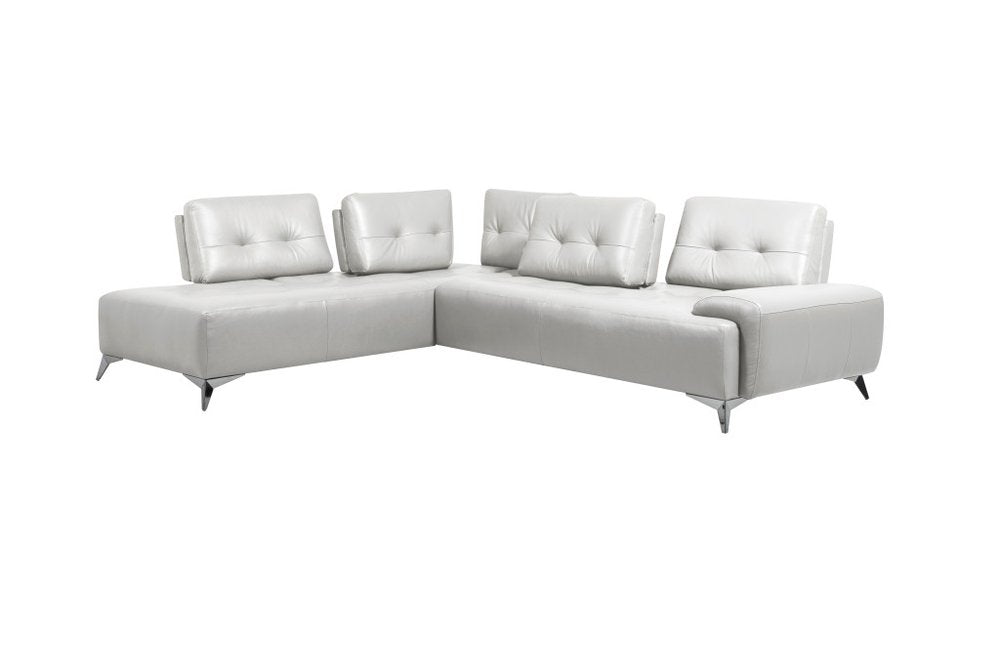 White leather L-shaped sectional sofa with tufted back cushions and silver metal legs on a white background.