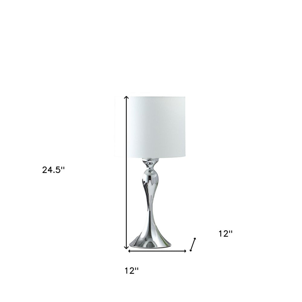 25" Silver Sleek Table Lamp With Off White Drum Shade. Table lamp isolated on a plain white background, finished in off-white.