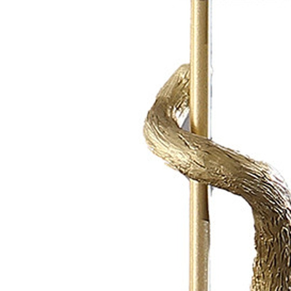 24" Gold Monkey Table Lamp With White Drum Shade. Table lamp isolated on a plain white background, showing its gold color.