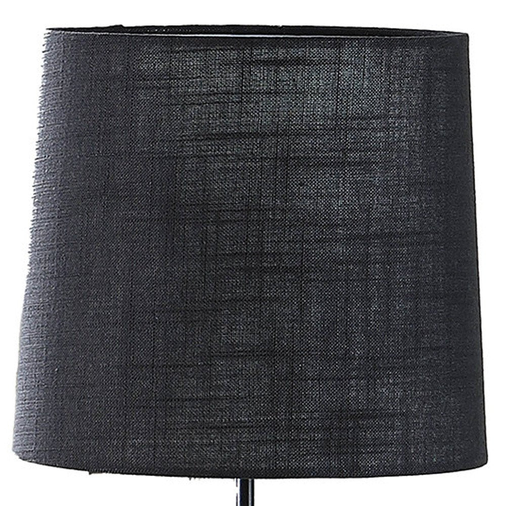 24" Antiqued Gold Monkey Table Lamp With Black Drum Shade. Table lamp isolated on a plain white background, finished in black.