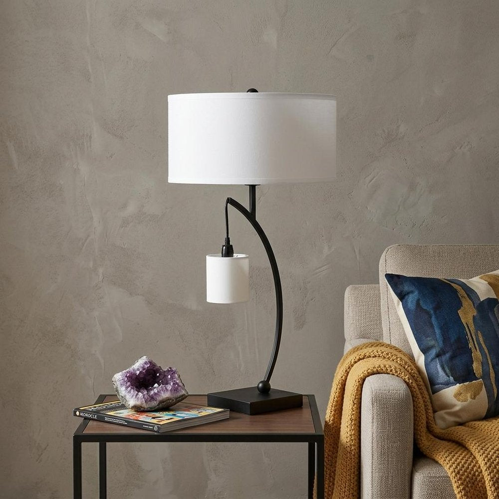 29" Black Metal Two Light Arched Table Lamp With White Drum Shade. Table lamp in black metal.