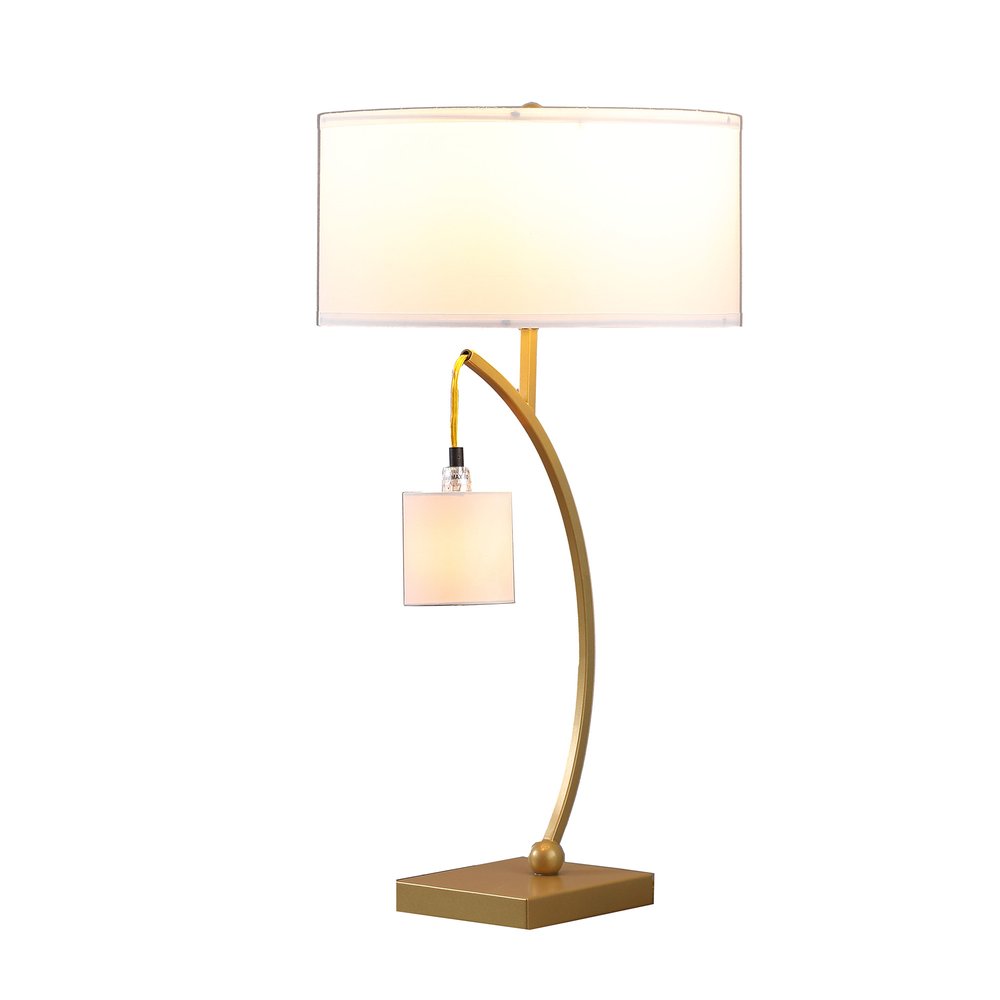 29" Gold Metal Two Light Arched Table Lamp With White Drum Shade. Table lamp isolated on a plain white background, in a gold metal finish.