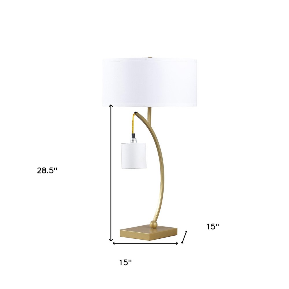 29" Gold Metal Two Light Arched Table Lamp With White Drum Shade. Table lamp isolated on a plain white background, finished in gold metal.