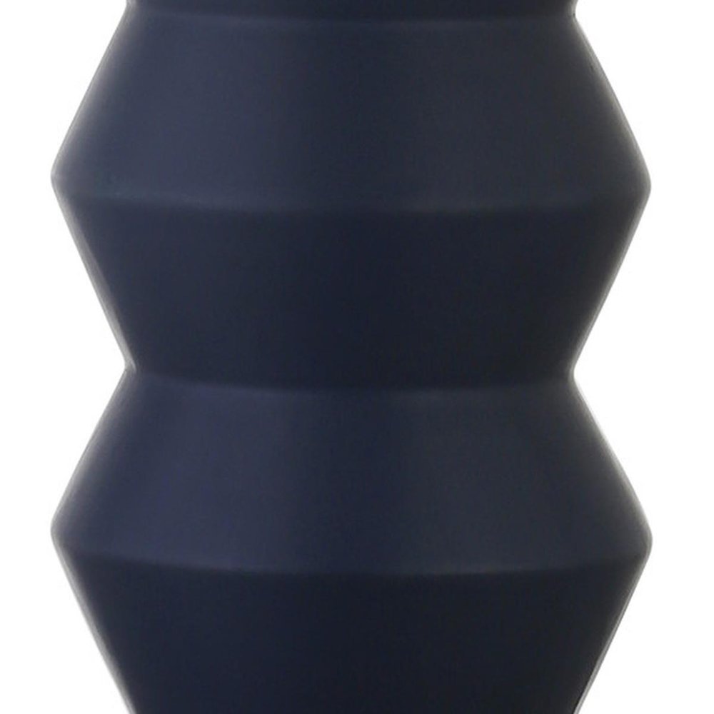 28" Navy Blue Geometric Table Lamp With Drum Shade. Table lamp isolated on a plain white background, in a navy finish.