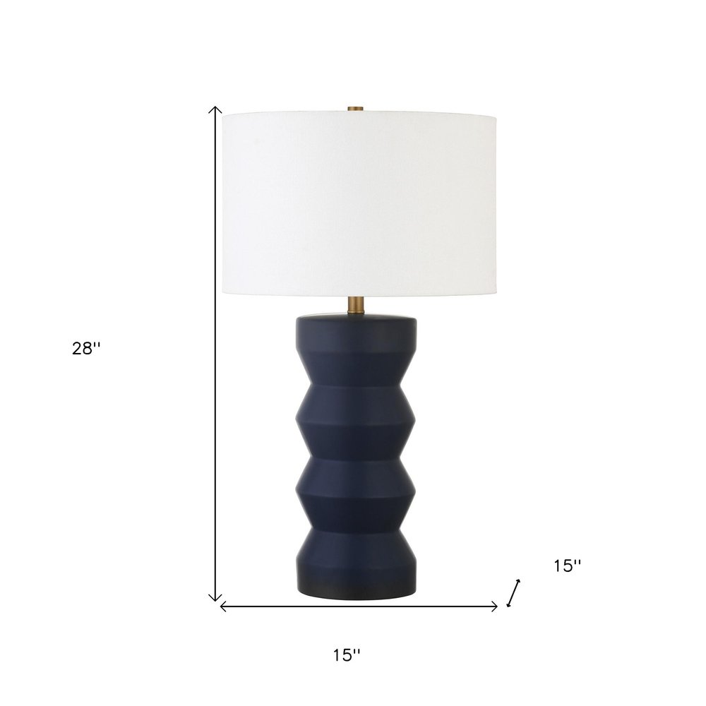 28" Navy Blue Geometric Table Lamp With Drum Shade. Table lamp isolated on a plain white background, finished in navy.