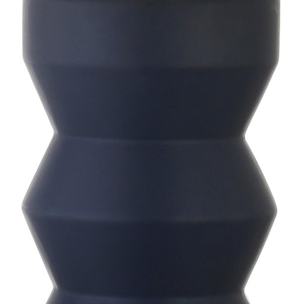 28" Navy Blue Geometric Table Lamp With Drum Shade. Table lamp isolated on a plain white background, finished in navy.